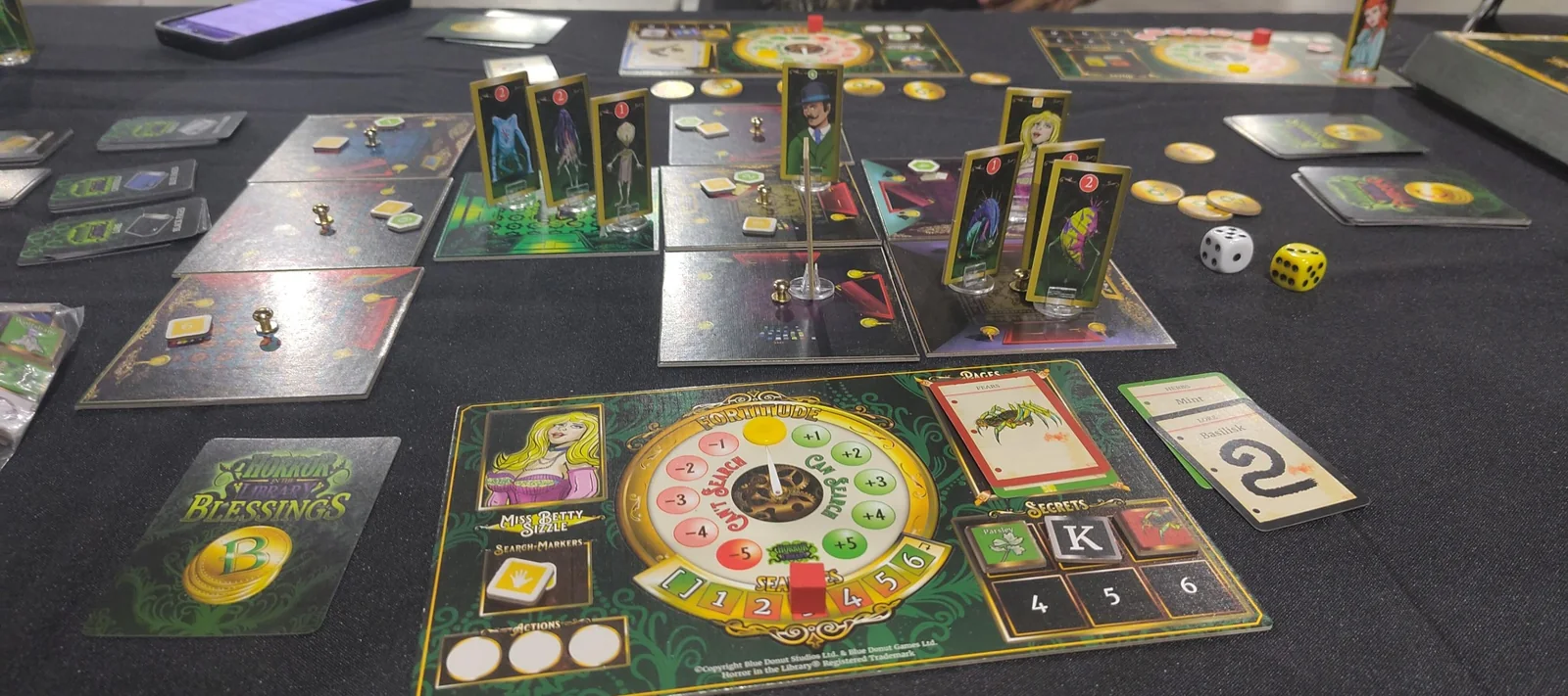 Horror in the Library being played on a table